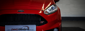 Front of Red Fiesta Showing Dyno Remaps Logo on Reg